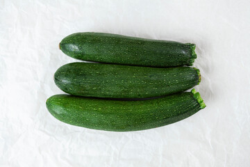 organic pumpkins next to each other on the ground