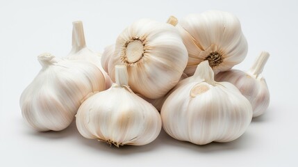 A Group of Fresh Garlic Bulbs on a White Background