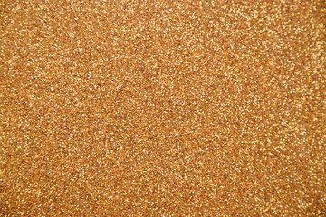 Processed collage of shiny golden glitter texture. Background for banner, backdrop or texture