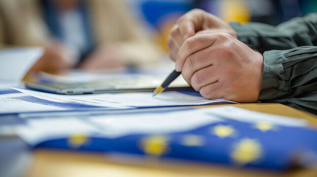 Closeup of a voter checking their name on the European Union election registry 