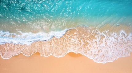 Aerial view of tide blue sea water and sandy beach