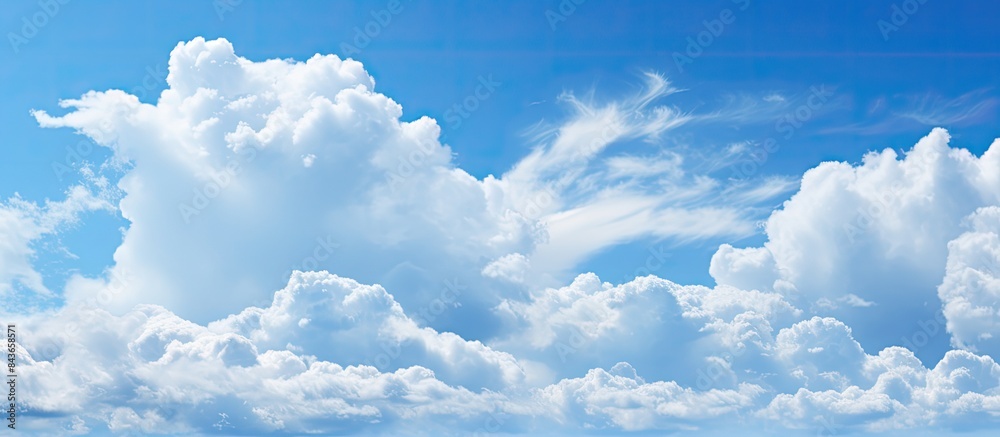 Poster The alternating blue sky and white clouds can serve as the background image. copy space available