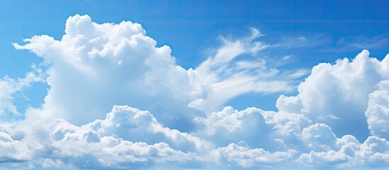 The alternating blue sky and white clouds can serve as the background image. copy space available