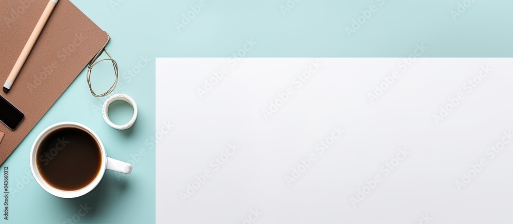 Poster office workplace table with blank paper page coffee cup supplies and laptop flat lay top view with s