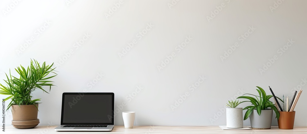 Aufkleber Flat lay composition with copy space of white desk table on home office Notebook blank sheets of paper pen and computer keyboard and a green plant as decoration