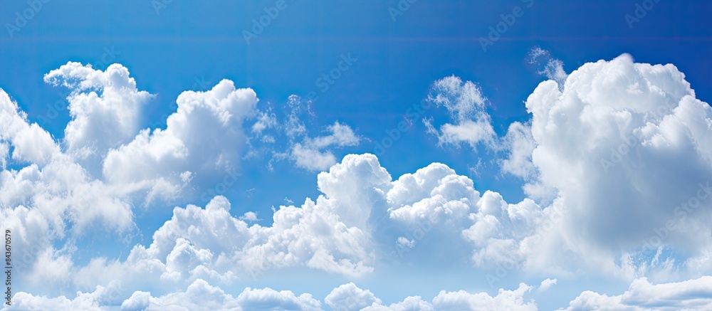 Aufkleber A stunning 21 9 view of a blue sky background featuring fluffy clouds with ample copy space image