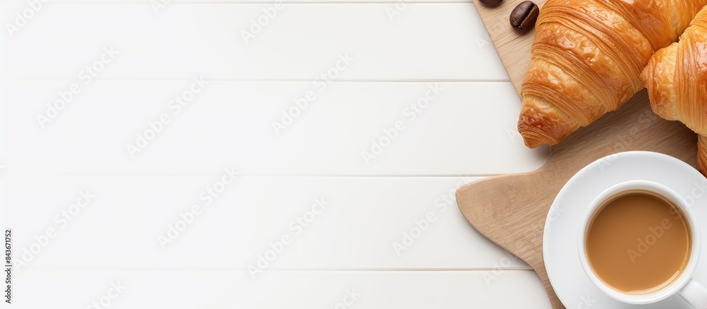 Poster fresh croissant and coffee cups isolated on white background breakfast concept creative layout top v