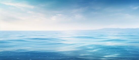 Obraz premium A serene abstract view of the ocean s tranquil surface in the early morning offering ample copy space for creative use