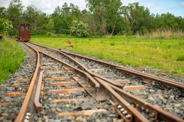 Obraz premium railway junction, and the back of a small locomotive