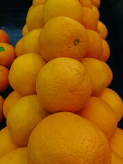 Tangerine background. Citrus fruit. Natural remedy for colds. Vegetarian food. Fresh mandarin oranges fruit or tangerines background.