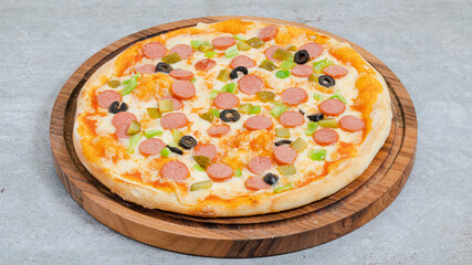 Delicious pizza isolated on wooden board