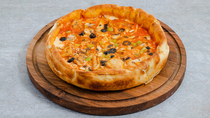 Delicious pizza isolated on wooden board