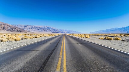 State Route 190 crossing Panamint Valley in Death Valley National Park California United States Empty desert road in Death Valley with clear blue sky : Generative AI