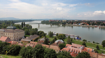 The Danube River forms the border between Hungary and Slovakia, as seen from the Hungarian side in Esztergom. The Maria Valeria Bridge connects the two countries.