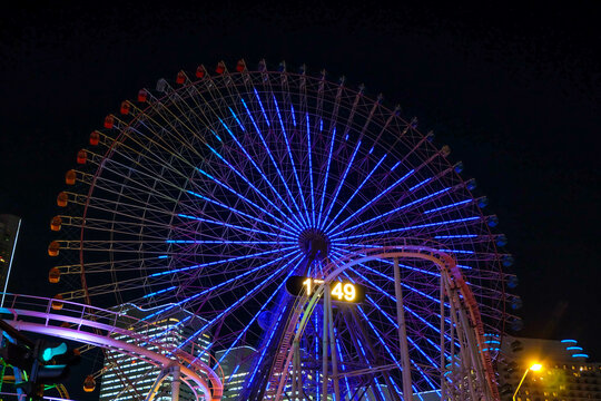 Ferris wheel at cosmo world fun park at minato mirai , Yokohama is the third biggest city in Japan.