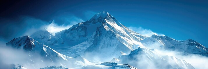 Snowy Mountain Peak with Clear Blue Sky