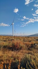 Windmill turbine in natural field for generating hydrogen from air or water wind into pipe, green hydrogen nitrogen forming nitrogen fertilizer production banner concept, green environmental protectio