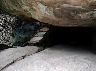 Cave under the rock 