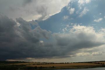 A large field with clouds