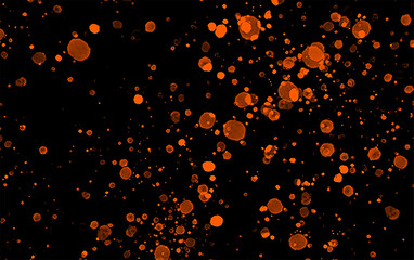 Bokeh of orange color on black background