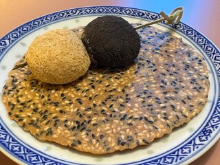 Creamy black sesame milk tea pudding with sesame cracker and sesame and kinako mochi