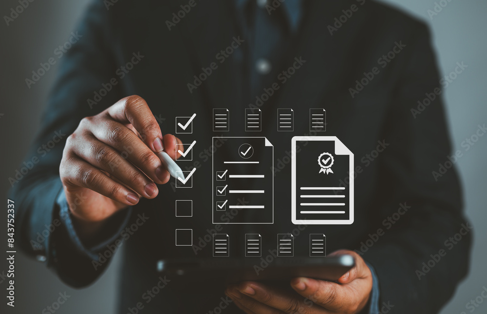 Poster Document management system DMS. Assessment form, questionnaire, checklist and clipboard task management. Businessman working on laptop computer productivity checklist and filling survey form online.