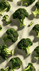 Many pieces of broccoli on a green background