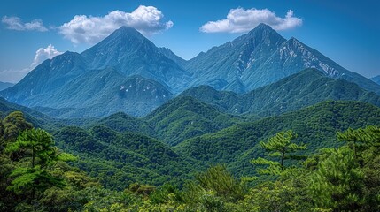Obraz premium World environment day concept: Green mountains and beautiful blue sky clouds 
