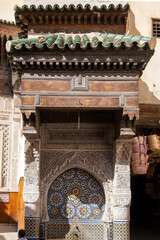 Fez - Partial view of the Nejjarine Fountain, traditional public fountain, one of the most beautiful in the old Medina. Morocco

