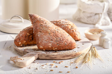 Homemade and tasty triangular buns freshly baked in home bakery.