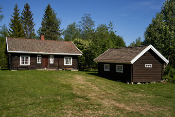 Obraz premium Beautiful traditional log house used as a cabin in the Norwegian wood