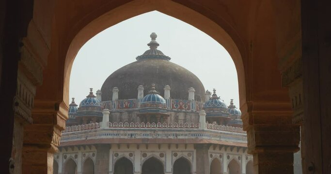 New Delhi, Delhi, India. Doves birds sitting on Isa Khan's Tomb near The Humayun's tomb. Famous place is Tomb of Mughal emperor, Mirza Nasir al-Din Muhammad commonly known as Humayun situated in Delhi