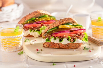 Homemade sandwich made of vegetables and beef.