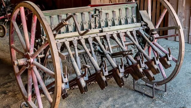 Old seed drill for growing grain, Germany