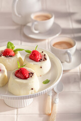 Sweet cheesecake monoportion with strawberry mousse and vanilla.