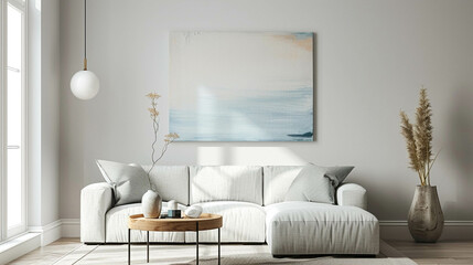 Clean design and confortable living room with a sofa against a wall with an abstract art of work in light pastel colors