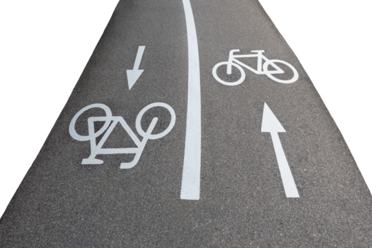 Bicycle lane signs with arrows in two directions on asphalt road, isolated image on transparent background, urban city concept, green city