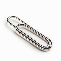 Isolated silver paperclip on white background