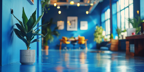 Bright and Modern Office Lounge with Plants and Blue Walls