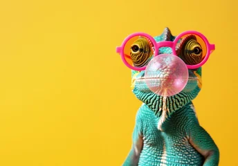  Quirky chameleon in pink glasses blowing a bubble © paffy