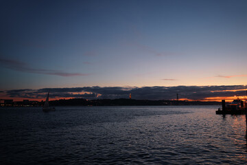 Fototapeta premium Sunset on the river Tejo Tagus at Lisbon, Portugal.