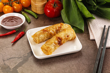 Vietnamese stuffed spring roll served sauce
