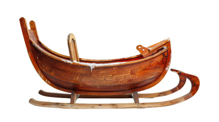 A vintage wooden sled with a curved seat and runners, isolated on a black background.