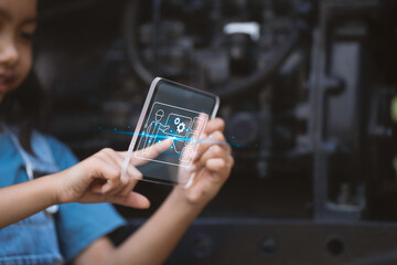 Girl touching a virtual screen, girl is studying and learning about machinery, educational technology