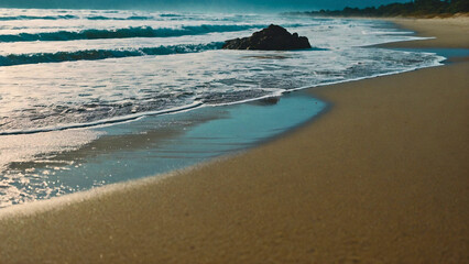 A beautiful sandy beach, with a beautiful blue sea.