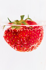 strawberry in water