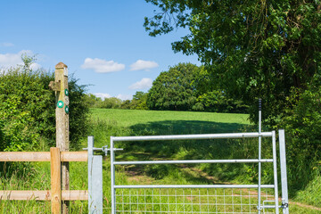 Gate to a public footpath over farmland in the English Countryside
