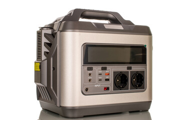 One battery universal electric, portable charging station, macro, isolated on white background.
