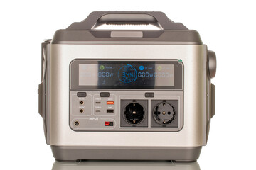 Fototapeta premium One battery universal electric, portable charging station, macro, isolated on white background. 