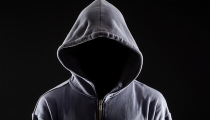 person without a face in a hooded gray jacket on a black background